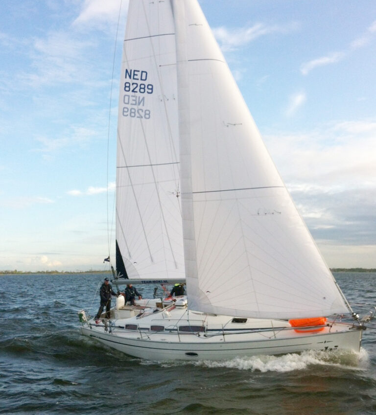 bavaria yacht sailing with new sails, triradial cut