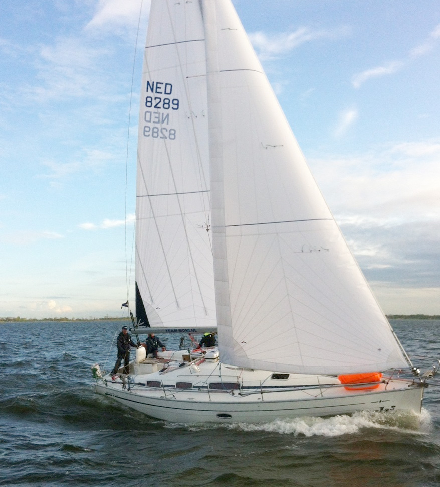 bavaria yacht sailing with new sails, triradial cut