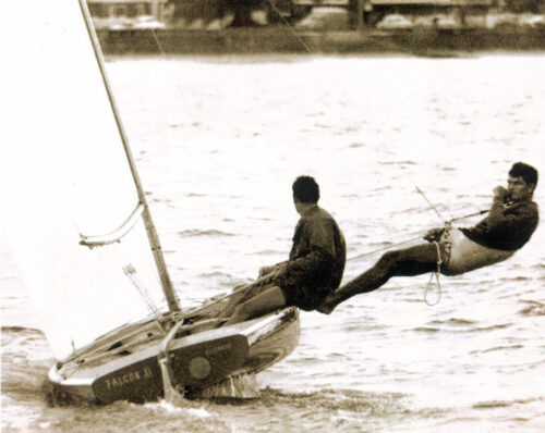 old photo of Rolly Tasker sailing a dinghy 3